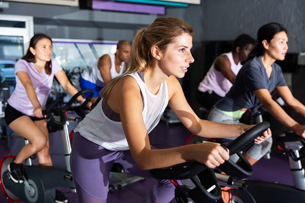 Women in cycling class at fitness center